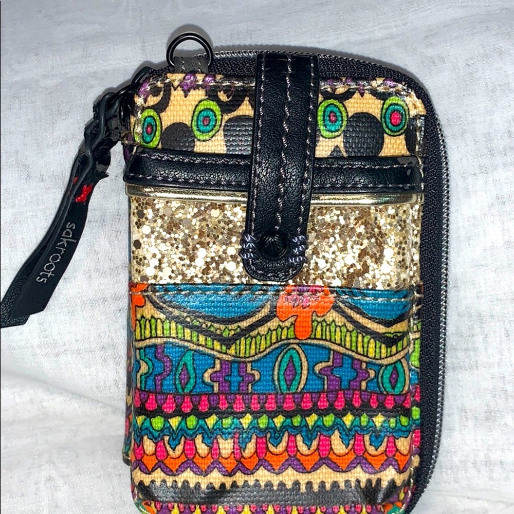 Sakroots wristlet wallet with phone holder